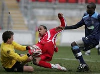 Woking sign Loick Pires from Welling