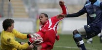 Woking sign Loick Pires from Welling