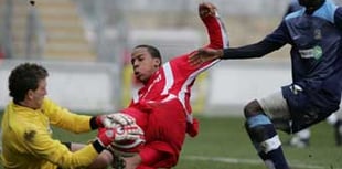 Woking sign Loick Pires from Welling