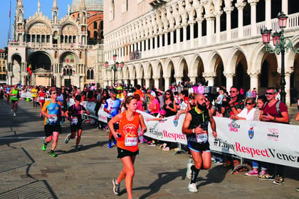 Horsell couple complete Venice Marathon for charity, despite injuries