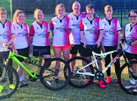 Woking FC Ladies get on their bikes for first-team