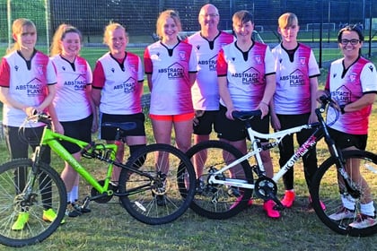 Woking FC Ladies get on their bikes for first-team