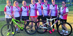 Woking FC Ladies get on their bikes for first-team