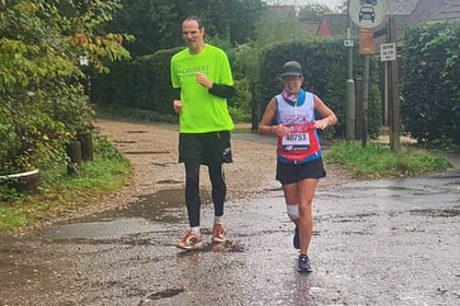 Local support spurs on marathon efforts to beat the weather