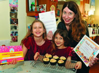 Young baker Izzy, 6, raises £1,100 for charity