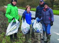 Scouts get to work on village clear-up