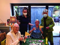 Care home residents celebrate jabs with a party