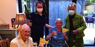 Care home residents celebrate jabs with a party