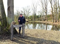 Recognition for villager who suggested flood-averting pond