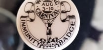 Mystery of Woking carnival badge found in Canada