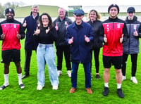 Woking FC players and staff all aiming for a place on the wing