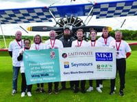 Woking FC team show their wing skills