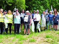 Spring clean volunteers collect a mound of litter