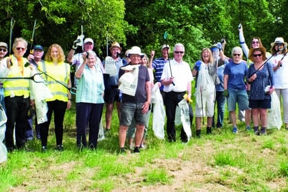 Spring clean volunteers collect a mound of litter