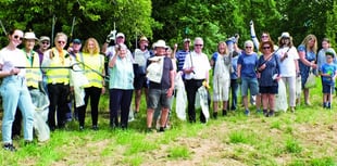 Spring clean volunteers collect a mound of litter