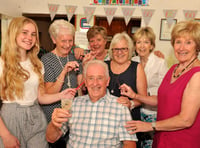 Clive clocks up 60 years in hairdressing