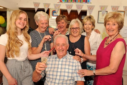 Clive clocks up 60 years in hairdressing