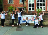 Staff taking on 18-mile hike to raise school funds