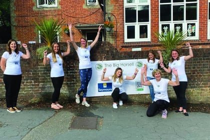 Staff taking on 18-mile hike to raise school funds