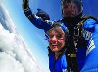 Postie takes on 15,000ft skydive for Mind