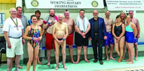 Swimmers dive in to support charity relay