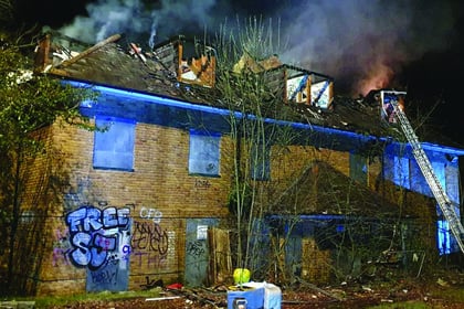 Blaze rips through roof of former hospital 