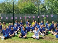 Pupils plant a mini orchard for jubilee