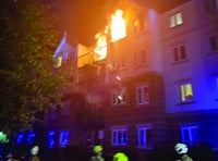 Evacuation as fire grips flats