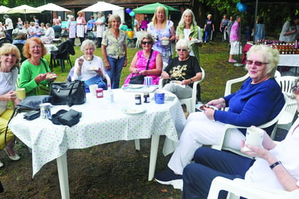 Tea and cake finale brings charity total to £14,400