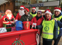 Woking Mayor helps with bucket collection for charity