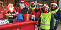 Woking Mayor helps with bucket collection for charity