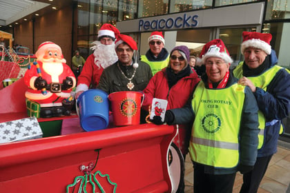 Woking Mayor helps with bucket collection for charity