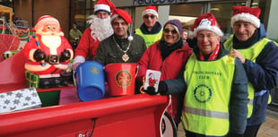 Woking Mayor helps with bucket collection for charity