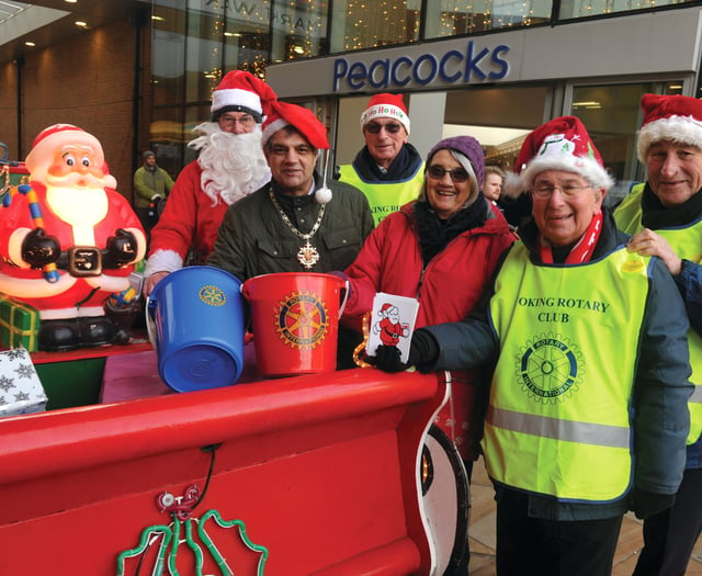 Woking Mayor helps with bucket collection for charity