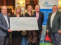 West Byfleet golfers chip in with charity cheque