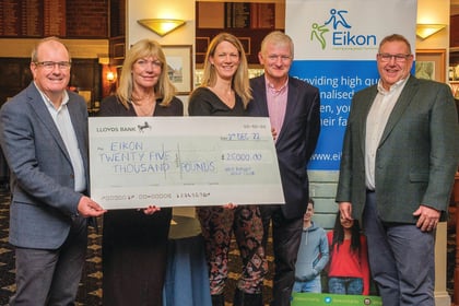 West Byfleet golfers chip in with charity cheque