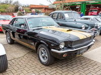 Classic cars alongside new cafe 