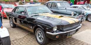 Classic cars alongside new cafe 