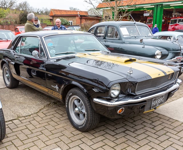 Classic cars alongside new cafe 