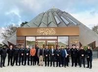 Police officers and firefighters show support for Muslim colleagues