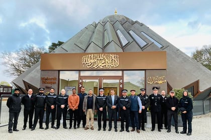 Police officers and firefighters show support for Muslim colleagues