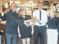 Pub honoured for years of help given to Woking Royal Naval Association