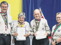 Duo's 118 years of service to Scouting in Woking really is dedication