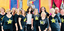 Special visitor as Rock Choir team up with neighbours for performance