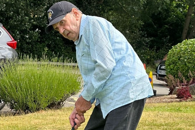 Dennis Clark playing golf at the Pyrford Lakes club
