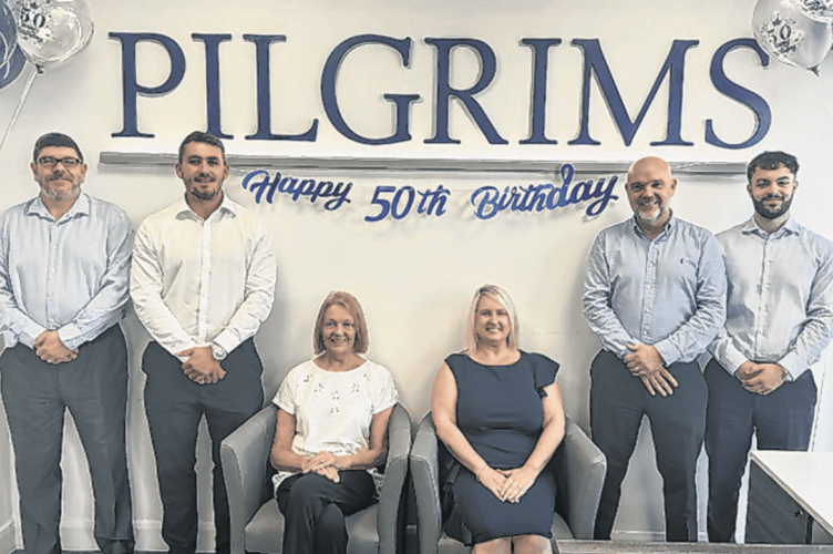 Pilgrims managing director Carla Munro, seated right, with the team