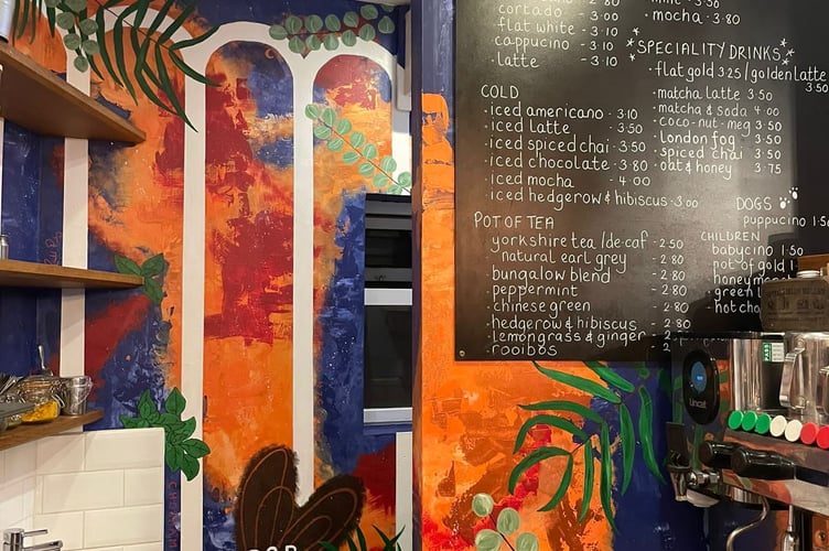 Rachel Pembrey painted a mural inspired by Basil & Blue Courtyard