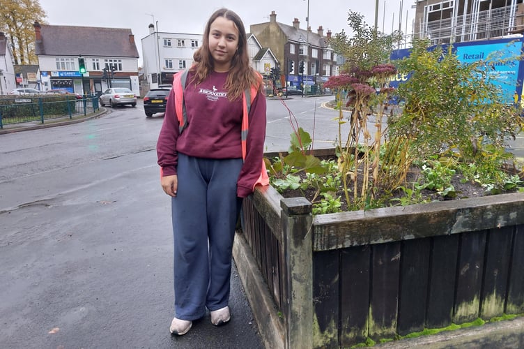 Allegra plants up a large container in West Byfleet as a valued member of the local gardening group