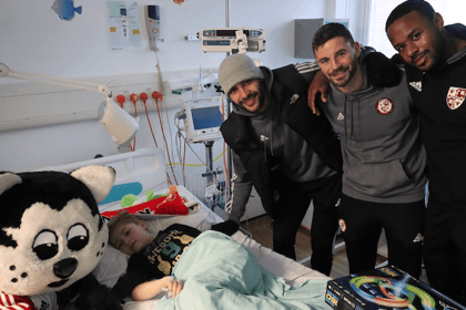 Footballers raise sick kids' spirits with annual visit to hospitals