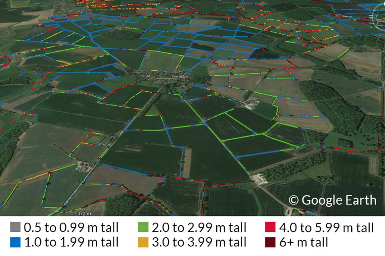 Hedgerow map overlaid on the Lincolnshire landscape. Release date  January 30 2024. See SWNS story SWLNhedges. A new high tech map of England's hedgerows have revealed they are now long enough to go round the world - ten times. The laser scanning shows a total of 390,000 km of hedgerows (one to six metres tall) in the country. Hedgerows contain hundreds of plant species, provide homes for nesting birds, small mammals and insects, and capture and store large amounts of carbon. Ecologists and scientists from the UK Centre for Ecology & Hydrology hedgrow hope the new map will guide planting and restoration of the vulnerable habitats. 